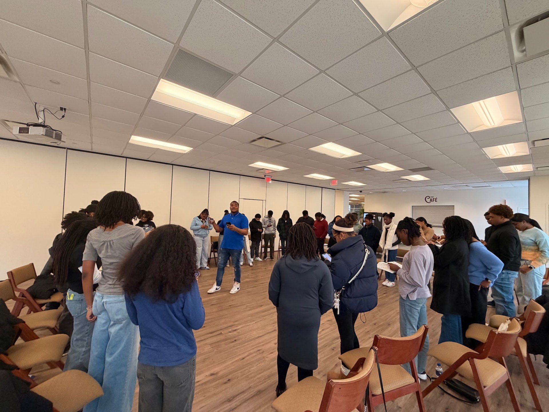 Interactive workshop with students standing in a circle
